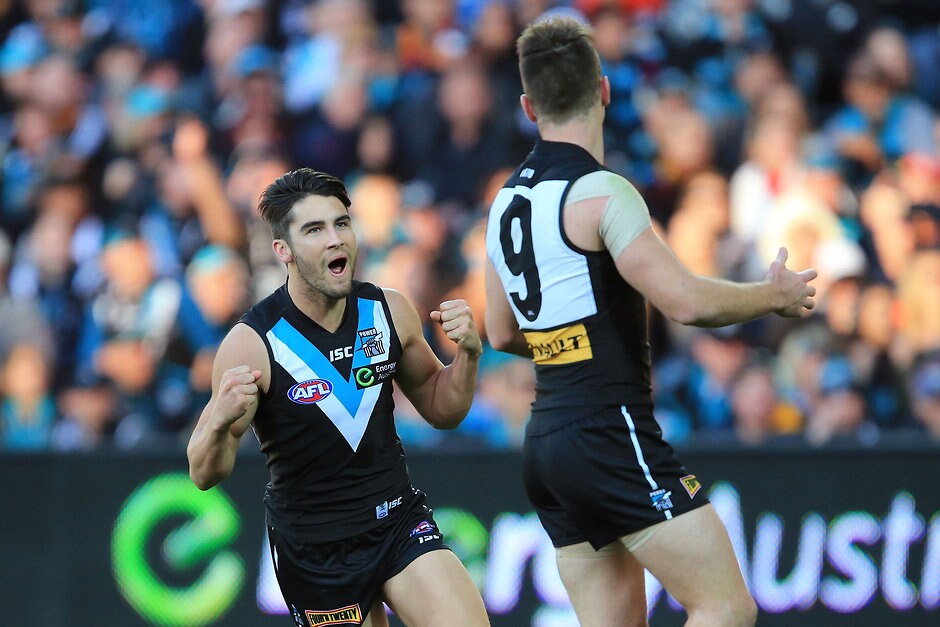 AFL 2015 Rd 16 - Port Adelaide v Adelaide ADELAIDE, AUSTRALIA - JULY 19: Chad Wingard and Robbie Gray of the Power celebrate a goal during the 2015 AFL round 16 match between Port Adelaide Power and the Adelaide Crows at the Adelaide Oval, Adelaide, Australia on July 19, 2015. (Photo by James Elsby/AFL Media)